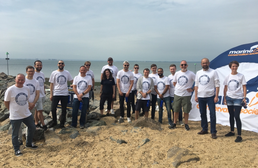 James out with the beach cleaning team