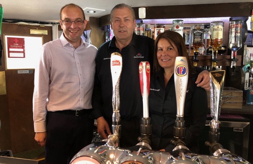 James Duddridge MP, landlord Allen Anderson and bar staff Angela Huntley