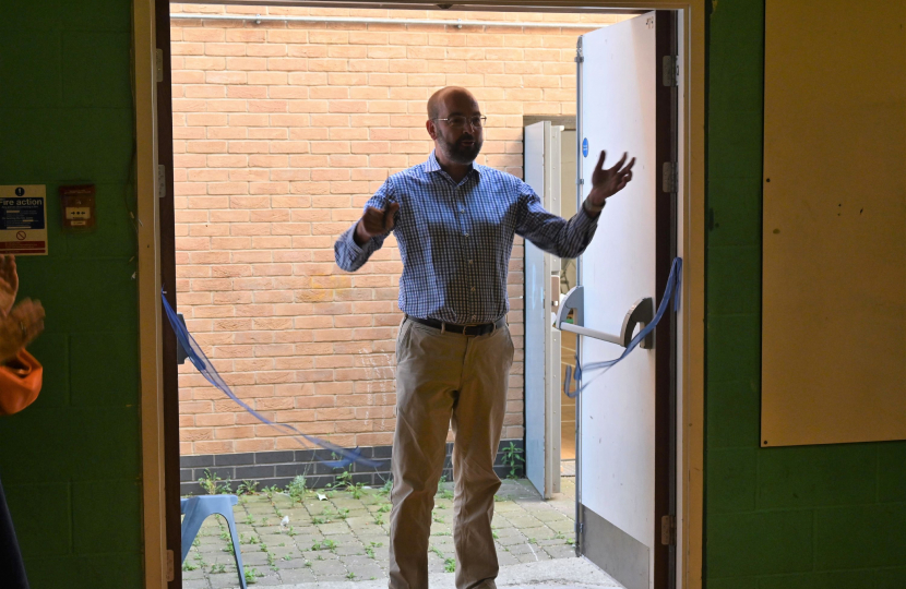 James Duddridge cutting the ribbon