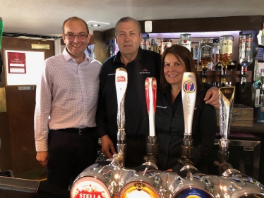 James Duddridge MP, landlord Allen Anderson and bar staff Angela Huntley