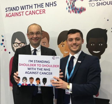 James Duddridge with a Cancer Research UK rep